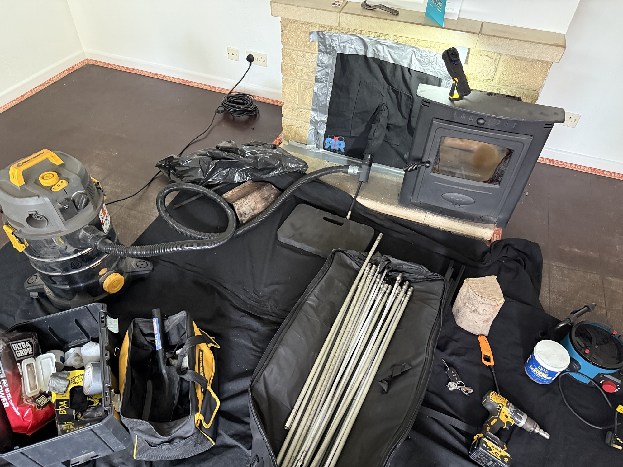 Chimney sweeping in progress in Dorset